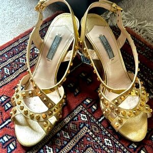 Authentic 💯 Prada gold studs wedge. Well Loved reflected in price. See all pics